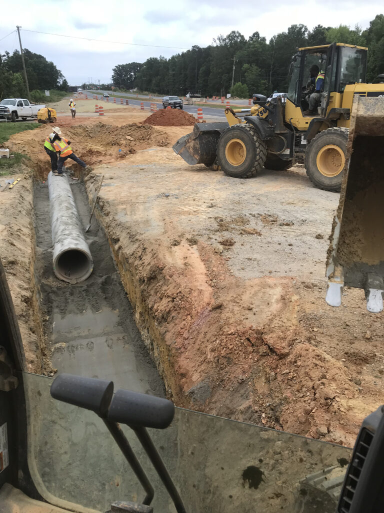 Installing drainage pipe.